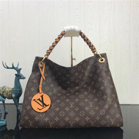 louis vuitton monogram canvas artsy mm with braided handle